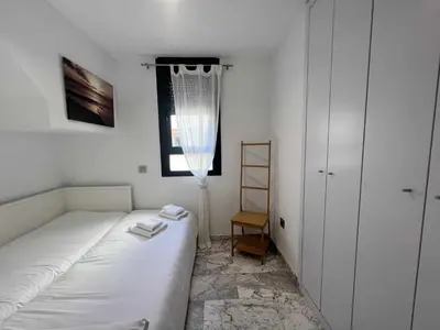 Cama o camas de una habitación en Ático San Bernardo Terraza y Parking Incluido