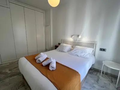 Cama o camas de una habitación en Ático San Bernardo Terraza y Parking Incluido