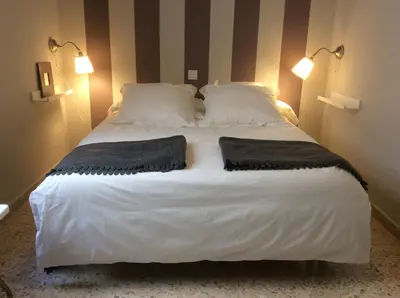 Cama o camas de una habitación en Sweet Home Alameda