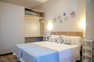 Cama o camas de una habitación en Loft AZAHAR y Loft BEGONIA
