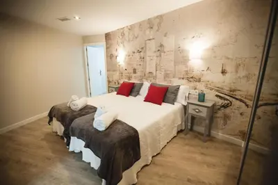 Cama o camas de una habitación en Loft AZAHAR y Loft BEGONIA