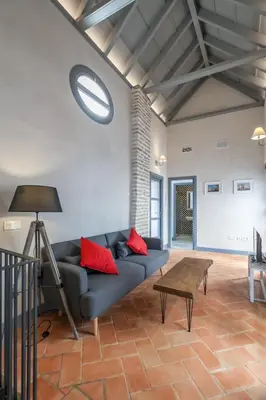 Zona de estar de Casas de Sevilla - Apartamentos Tintes12