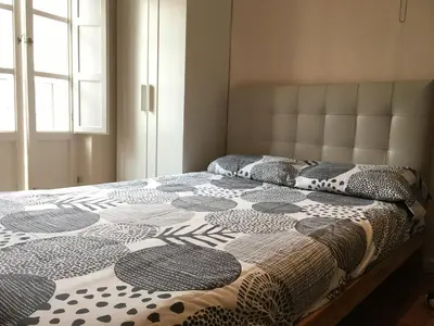 Cama o camas de una habitación en Vidrio Apartment