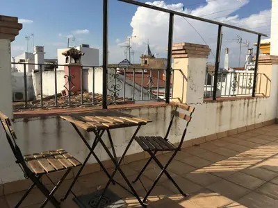 Un balcón o terraza de Vidrio Apartment