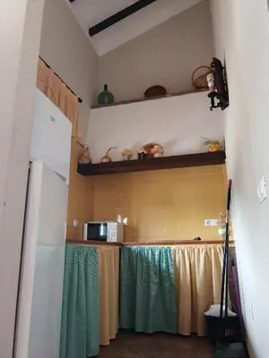 Una cocina o zona de cocina en La Solana de turón. La coscoja.