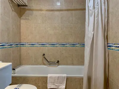 Un baño de Don Polvorón