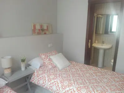 Cama o camas de una habitación en Charming Villadarias M. Palace apartment