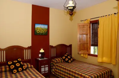 Cama o camas de una habitación en Casa de la Higuera