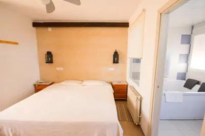 Cama o camas de una habitación en Hostal Nueva Andalucia