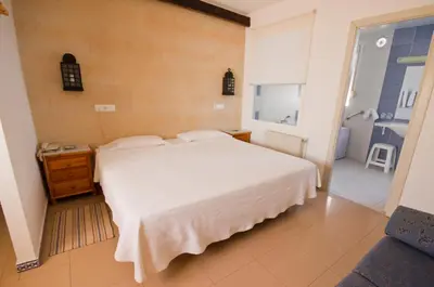 Cama o camas de una habitación en Hostal Nueva Andalucia