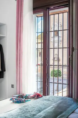 Cama o camas de una habitación en Amphora Alojamiento Ecija