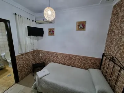 Cama o camas de una habitación en Pensión Javier