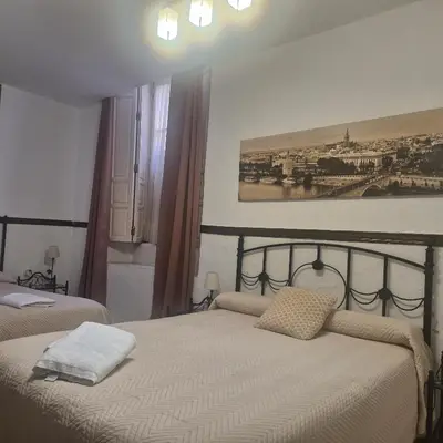 Cama o camas de una habitación en Pensión Javier