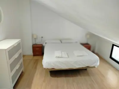 Cama o camas de una habitación en Apartamentos Centro Cordoba by MiRa