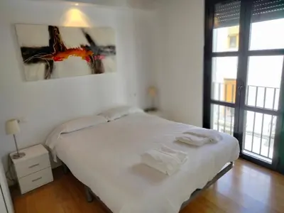 Cama o camas de una habitación en Apartamentos Centro Cordoba by MiRa