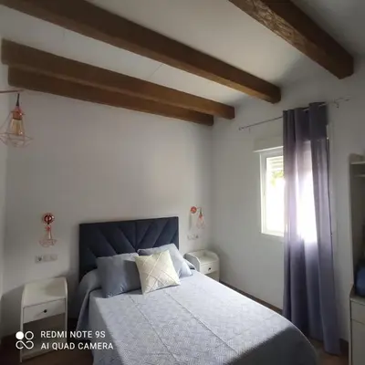 Cama o camas de una habitación en La Casa De La Abuela