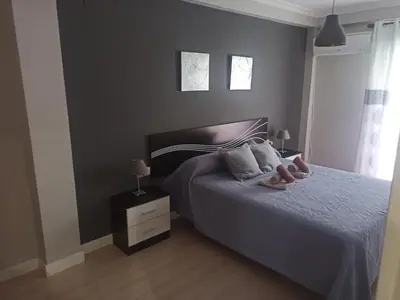 Cama o camas de una habitación en Apartamento con parking privado gratis incluido