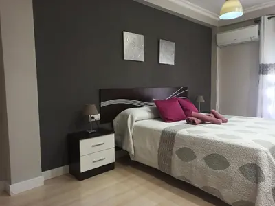 Cama o camas de una habitación en Apartamento con parking privado gratis incluido