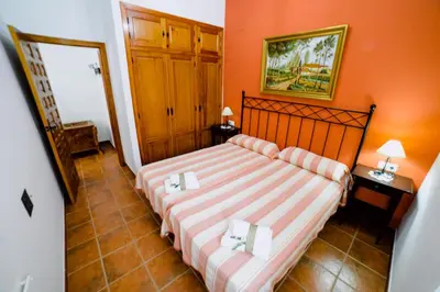Cama o camas de una habitación en Casa Rural San Antonio