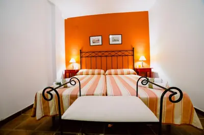Cama o camas de una habitación en Casa Rural San Antonio