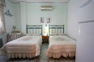 Cama o camas de una habitación en Hostal Jiménez