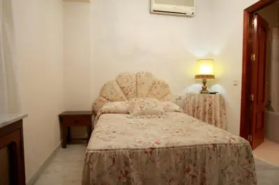 Cama o camas de una habitación en Hostal Jiménez
