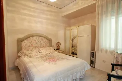 Cama o camas de una habitación en Hostal Jiménez