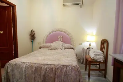 Cama o camas de una habitación en Hostal Jiménez