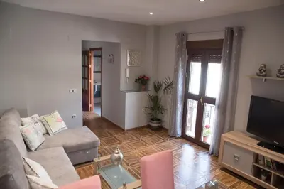 Una televisión o centro de entretenimiento en El Pilar Home