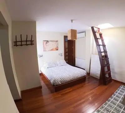 Cama o camas de una habitación en Loft con vistas en Plaza de Belén
