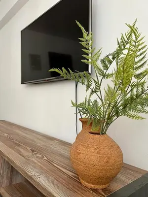 Una televisión o centro de entretenimiento en Apartamento en Centro - Vial