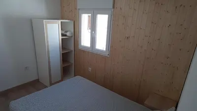 Cama o camas de una habitación en Acogedor apartamento en el barrio del Parlamento de Andalucía (Sevilla)