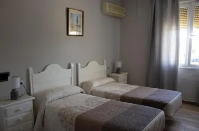Cama o camas de una habitación en Hostal Casa Jose