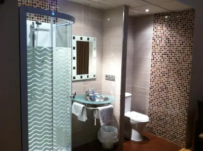 Un baño de Hotel El Cruce Moraleda