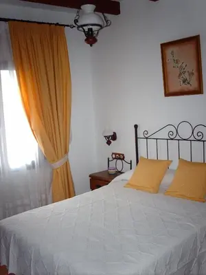 Cama o camas de una habitación en Casa Encina - Encinasola Turismo Rural.