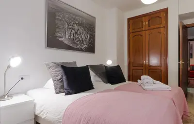 Cama o camas de una habitación en Apartamentos Turísticos Duque de Hornachuelos