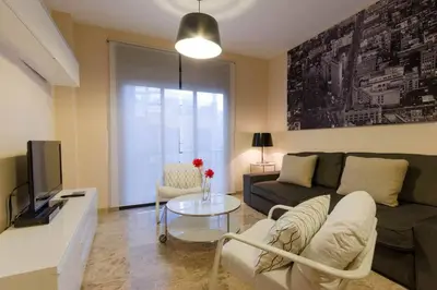 Una televisión o centro de entretenimiento en Apartamentos Turísticos Duque de Hornachuelos