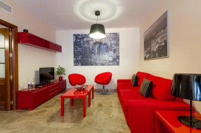 Una televisión o centro de entretenimiento en Apartamentos Turísticos Duque de Hornachuelos