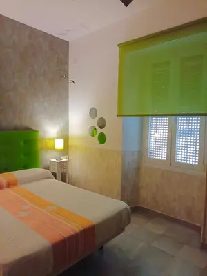 Cama o camas de una habitación en Oasi Macarena