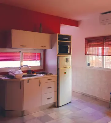 Una cocina o zona de cocina en Oasi Macarena