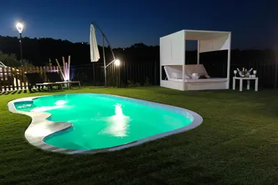 Piscina en o cerca de Casas Rurales el Balcon de la Brena