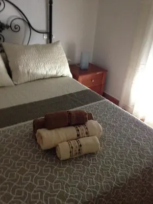 Cama o camas de una habitación en Casita Ardales