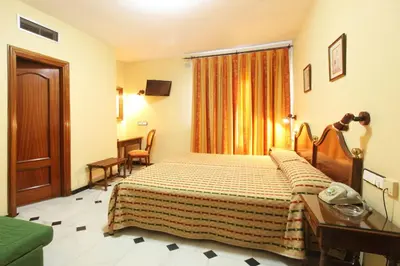 Cama o camas de una habitación en El Cisne