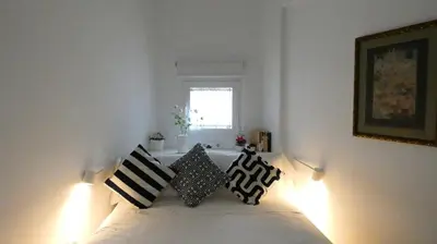 Cama o camas de una habitación en Azhar Suites