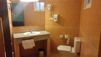 Un baño de Hotel Cabañas