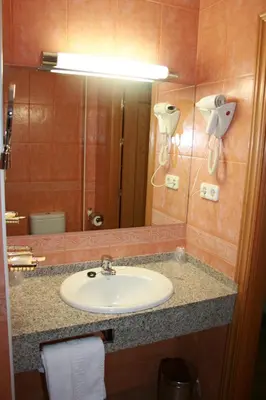 Un baño de Hotel Cabañas