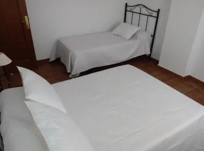 Cama o camas de una habitación en Alojamiento Rural El Orégano