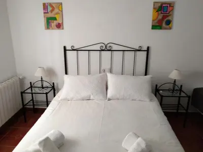 Cama o camas de una habitación en Alojamiento Rural El Orégano