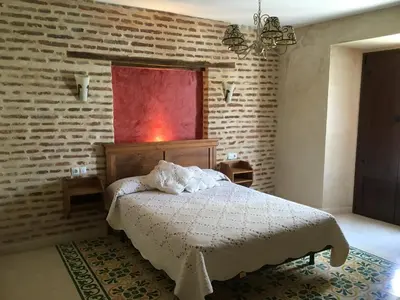 Cama o camas de una habitación en Casa Rural La Plazuela