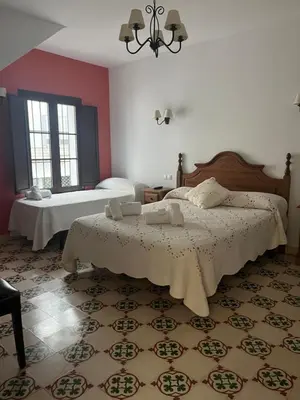Cama o camas de una habitación en Casa Rural La Plazuela